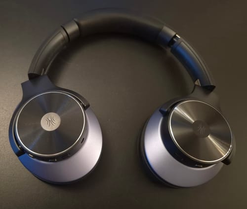 Close-up of black Oneodio headphones and their earcups